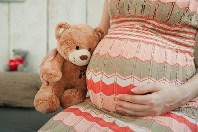 pregnant woman with bear
